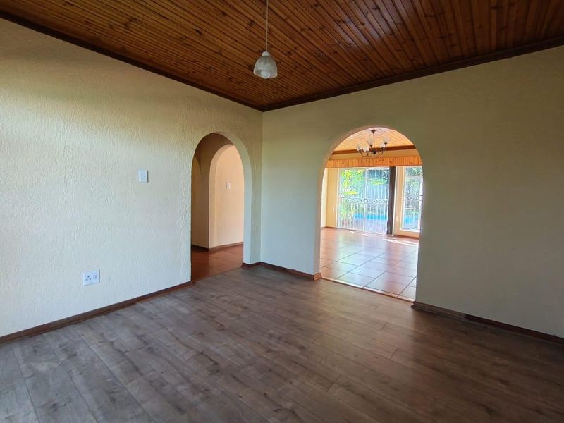 Spacious 5-Bedroom Home with Pool and Versatile Living Options - Photo 8