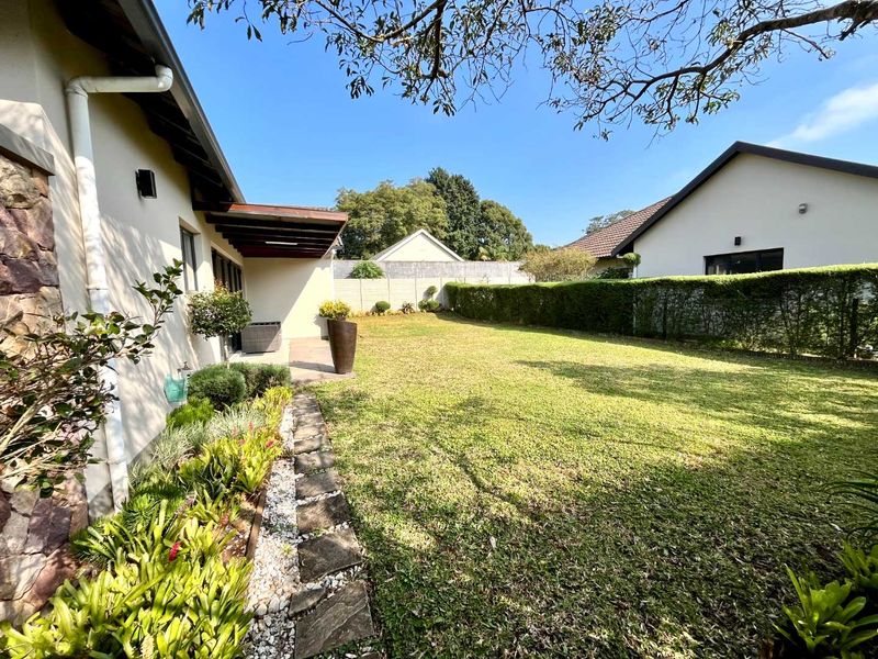 Stylish 3-Bedroom Family Home with Garden & Estate Amenities - Photo 3