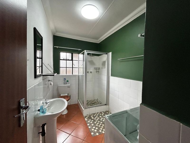 OFFERS WELCOME! Move-In Ready Gem: Spacious 3-Bedroom in Secure Village! - Photo 10