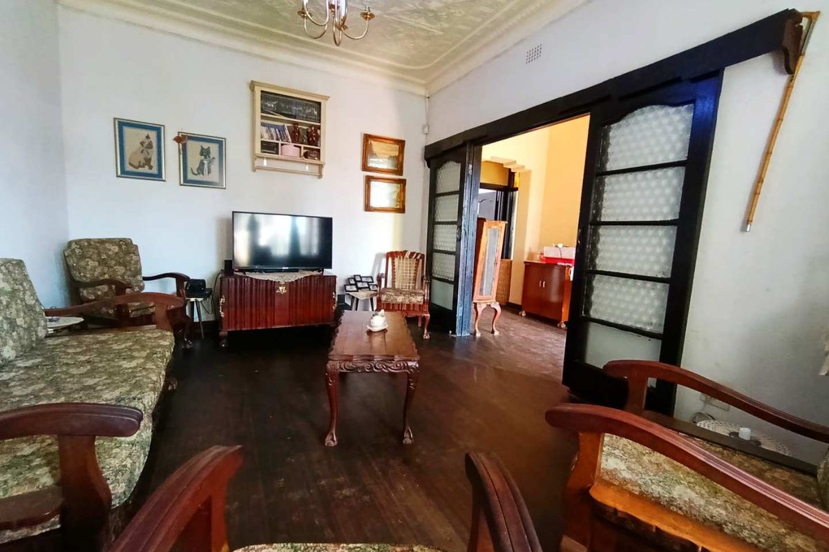 Neat 3-Bedroom Home with Income-Generating Cottage - Photo 4