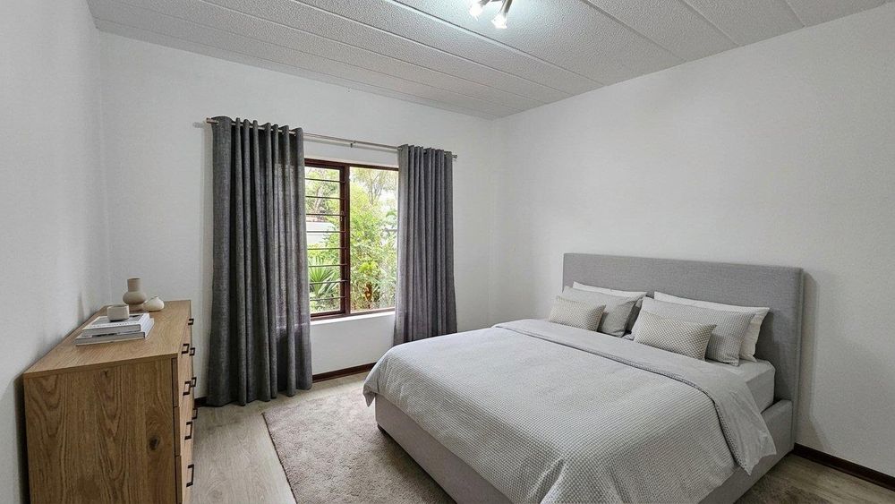 Main bedroom. Furniture added with Ai to give you a feel for the space. 