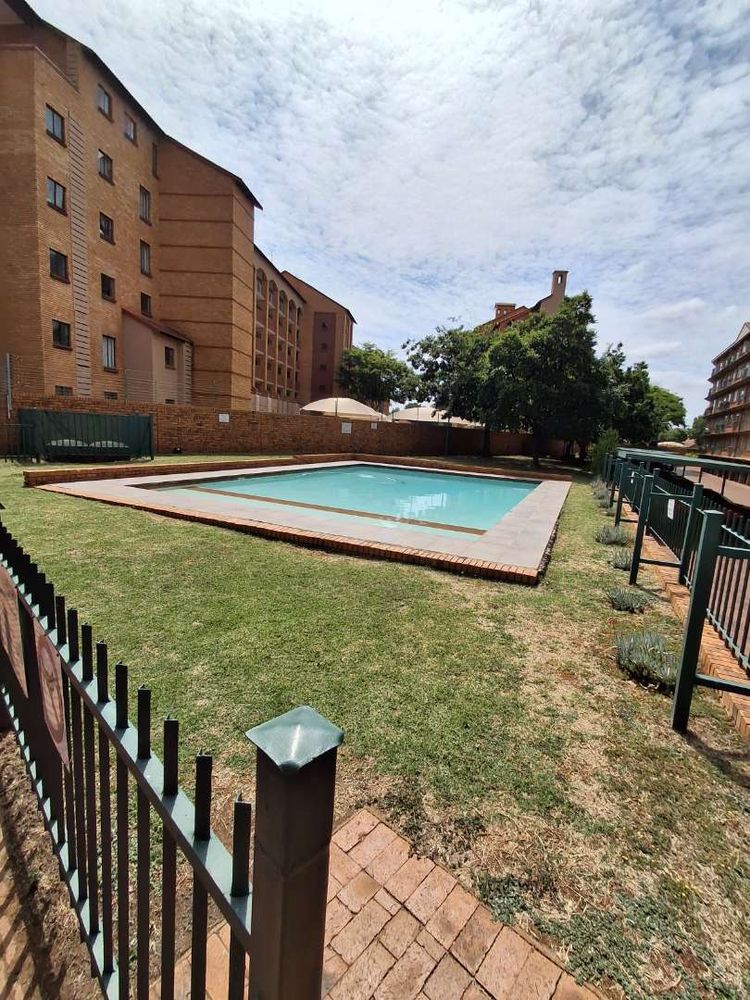 Communal Pool Area with Clubhouse
