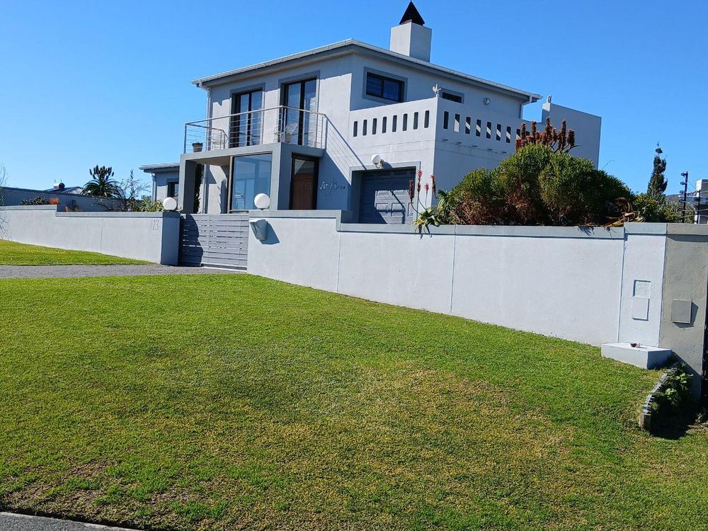 Upmarket House directly across the Street (from our Plot).