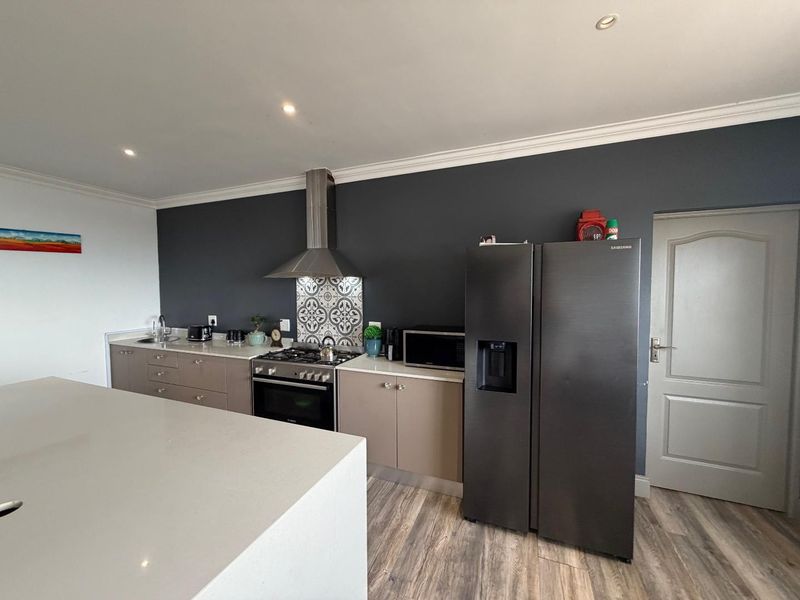 Modern Single-Level Cladded Brick Home with Ocean views - Photo 5