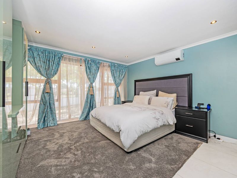 Striking Modern Family Home with Designer Finishes and Effortless Entertaining in Prime Panorama - Photo 10