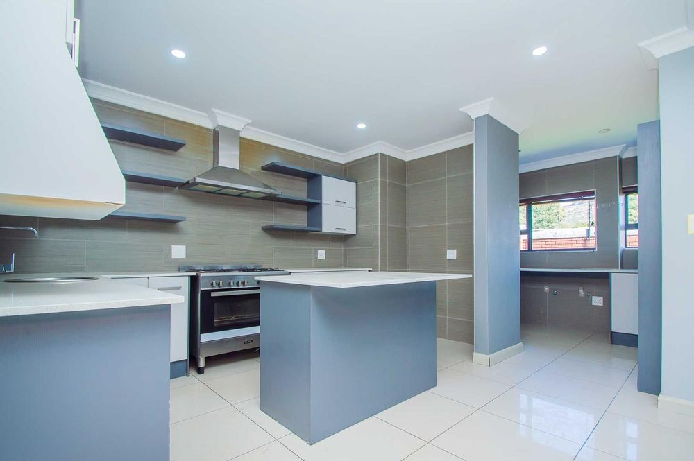 Modern kitchen with trending grey cabinets