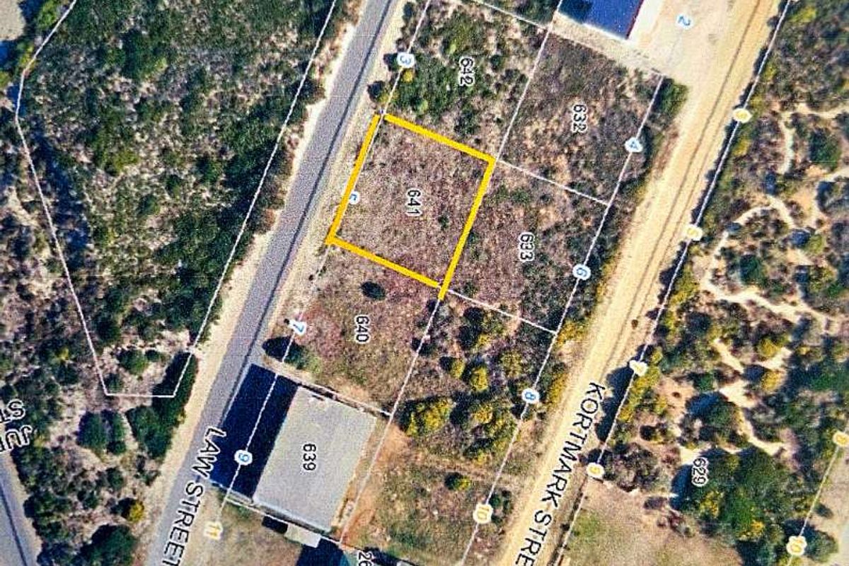 Aerial view of a vacant commercial land plot situated between Law Street and Kortimark Street, highlighting its location and surrounding street access.