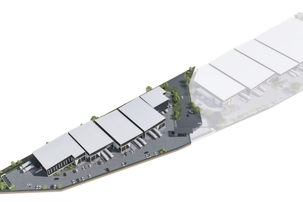 An aerial 3D architectural rendering of an industrial park development, showcasing multiple warehouse units, paved access roads, and landscaped perimeter areas.