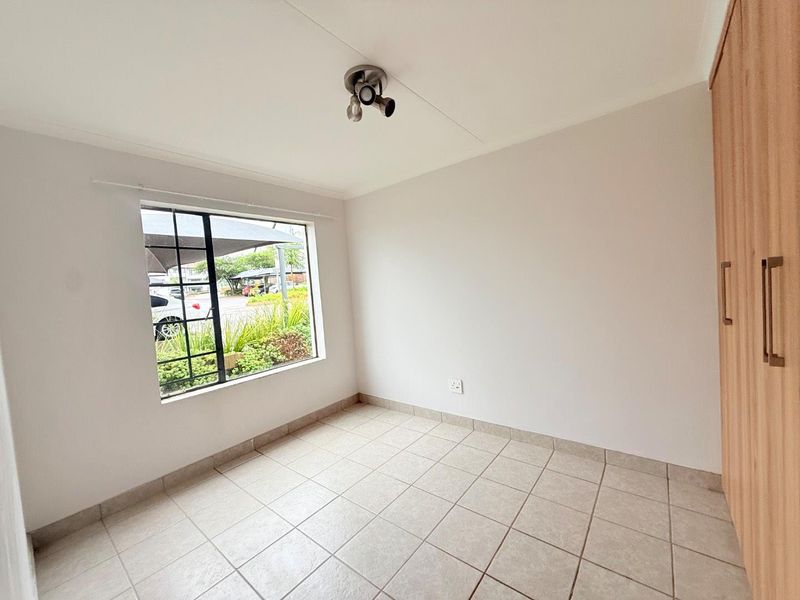 Elegant Living: 3-Bedroom Oasis in Octave Complex - Photo 8