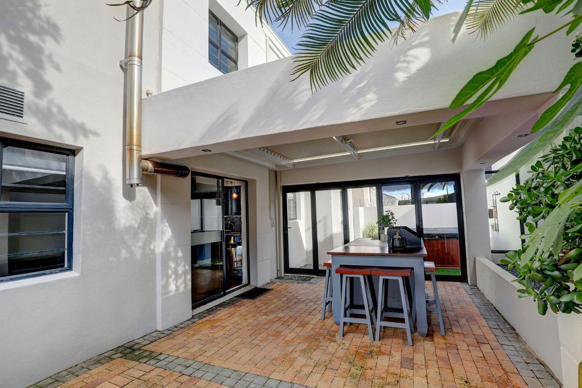 An exceptional opportunity to own a beautiful, modern home offering secure, stylish living in a sought-after, well-managed security estate! - Photo 3