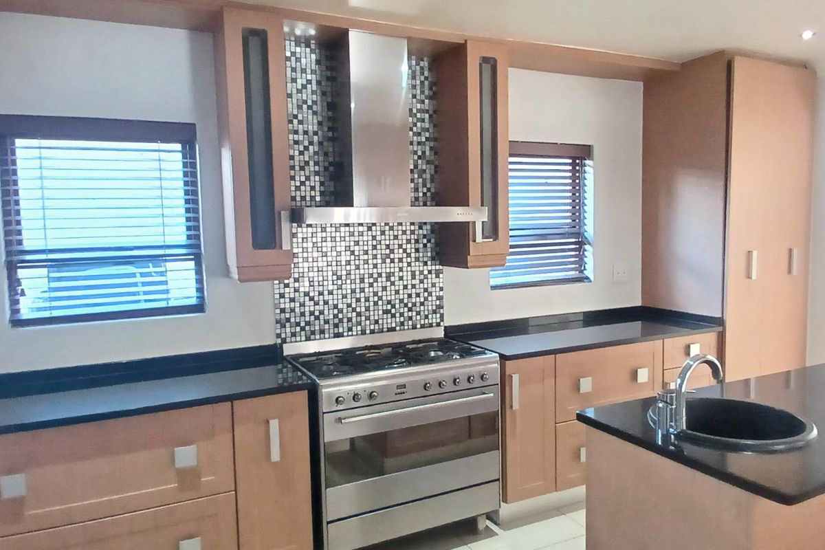 Modern Elegance in a Secure and Sought-After Estate - Photo 3