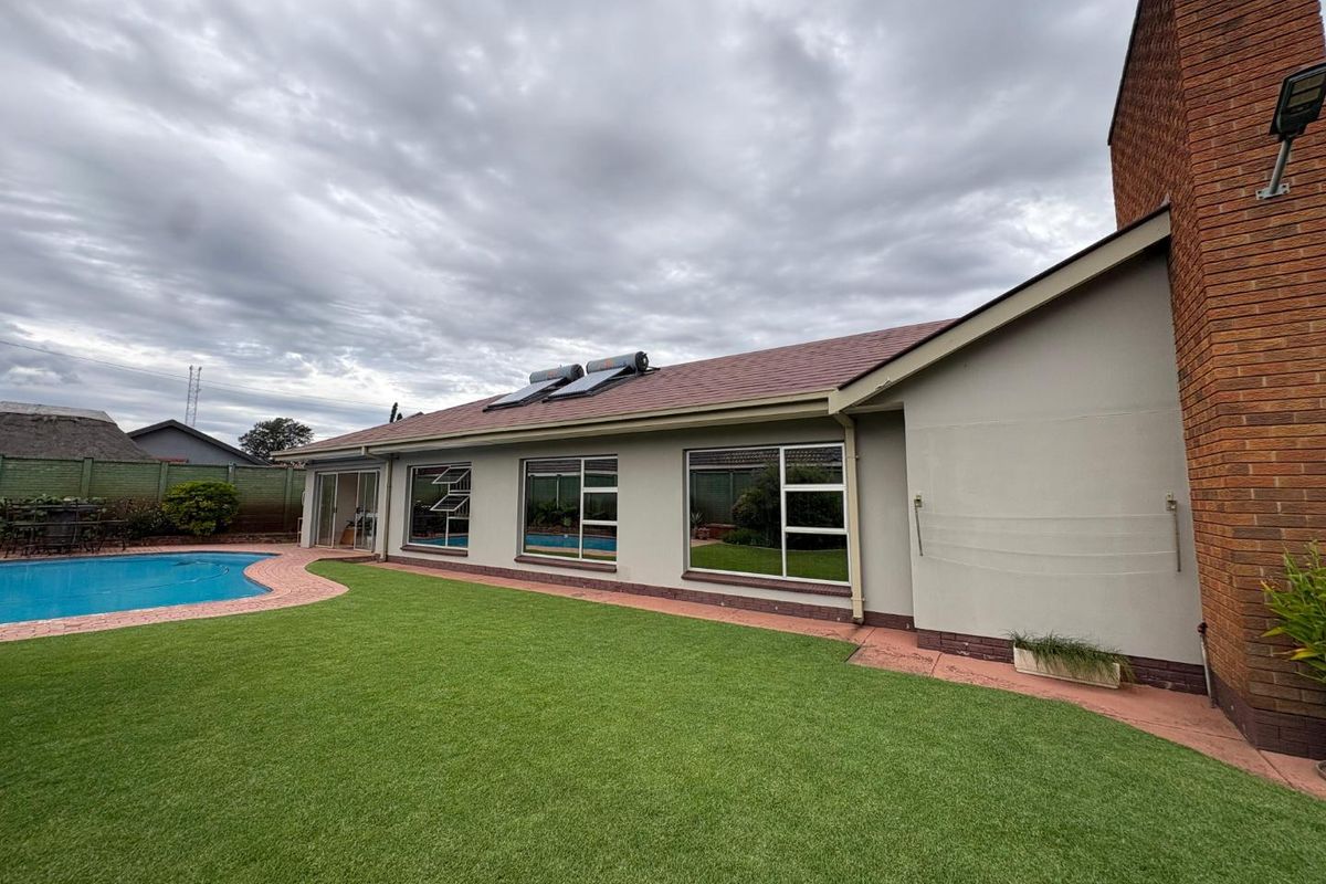 Exceptional 4-Bedroom Home with Premium Features - Photo 2