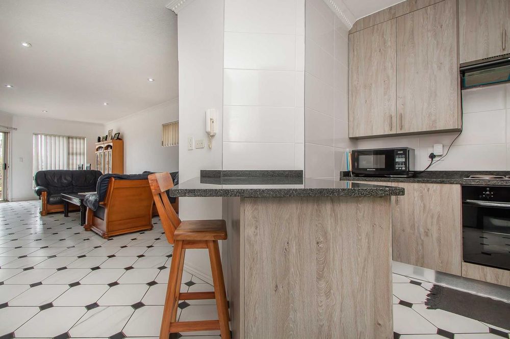 Kitchen is semi-open plan and well placed 