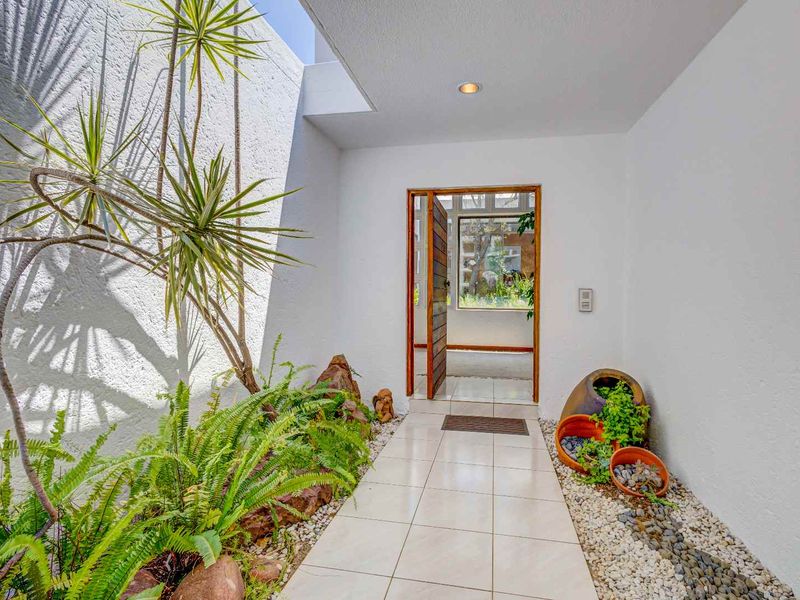 Warm, Light-Filled Home with Tranquil Garden Setting in Fourways Gardens Phase 2 - Photo 2