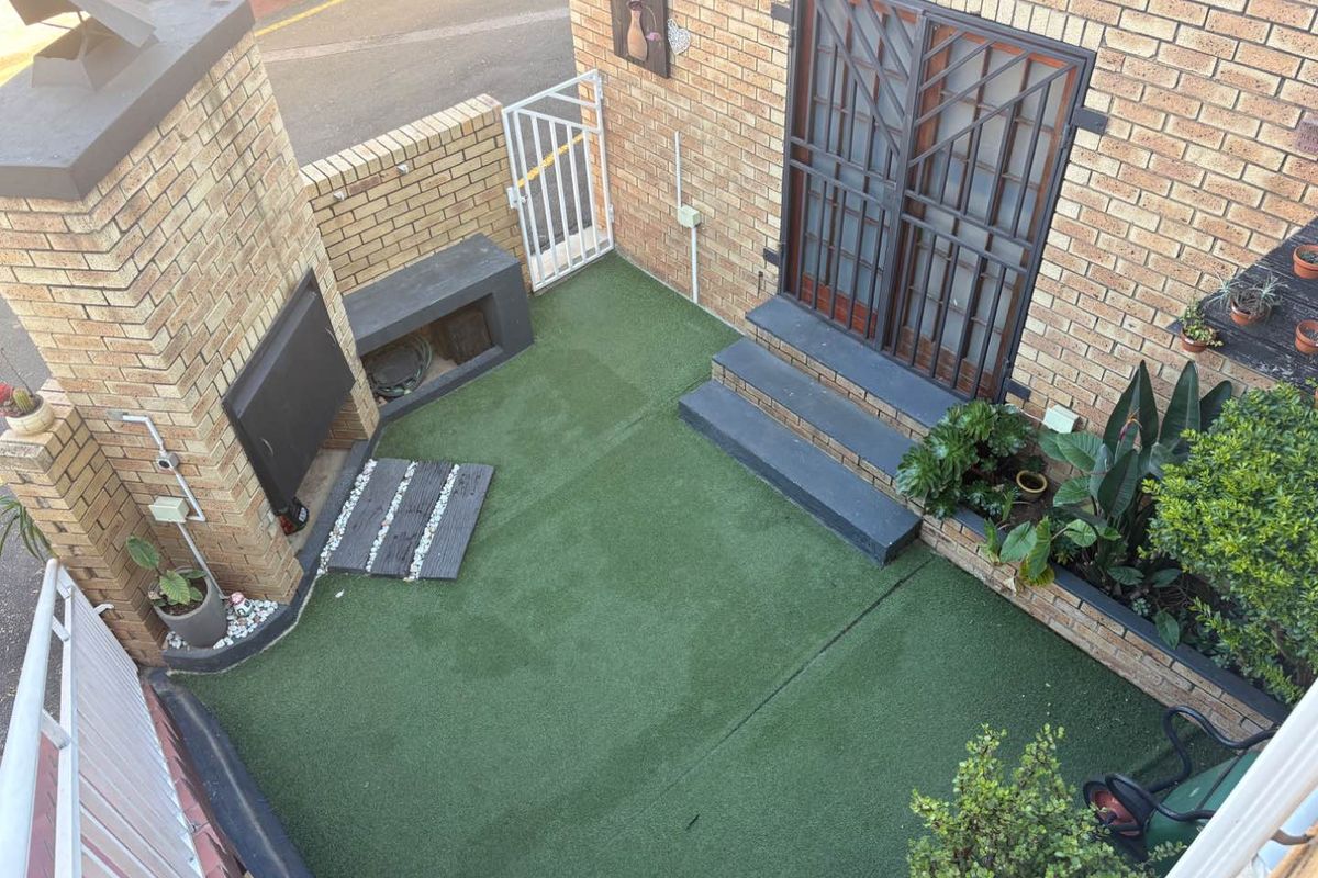 Modern Family Townhouse in Secure 24-Hour Guarded Complex - Photo 2
