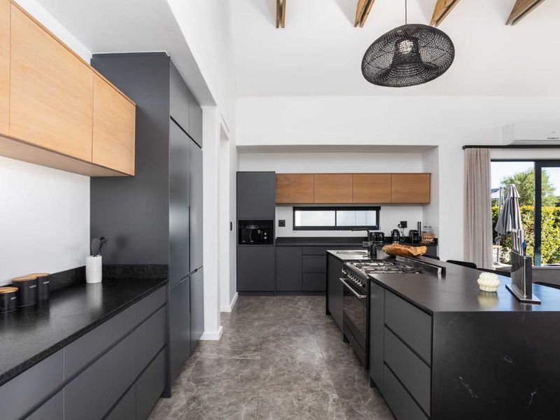 Modern living on Val de Vie Estate in a Beautifully Fully Furnished Three-Bedroom Home - Photo 3