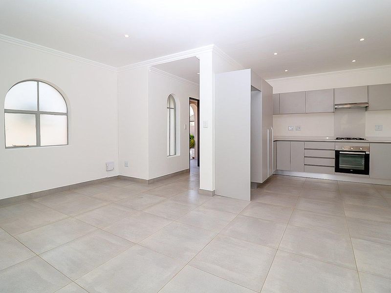 Modern Comfort Meets Secure Garden Living! - Photo 10