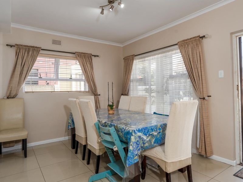 Stylish Family Home Featuring Master Suite, Pool, and Open-Plan Living - Photo 6