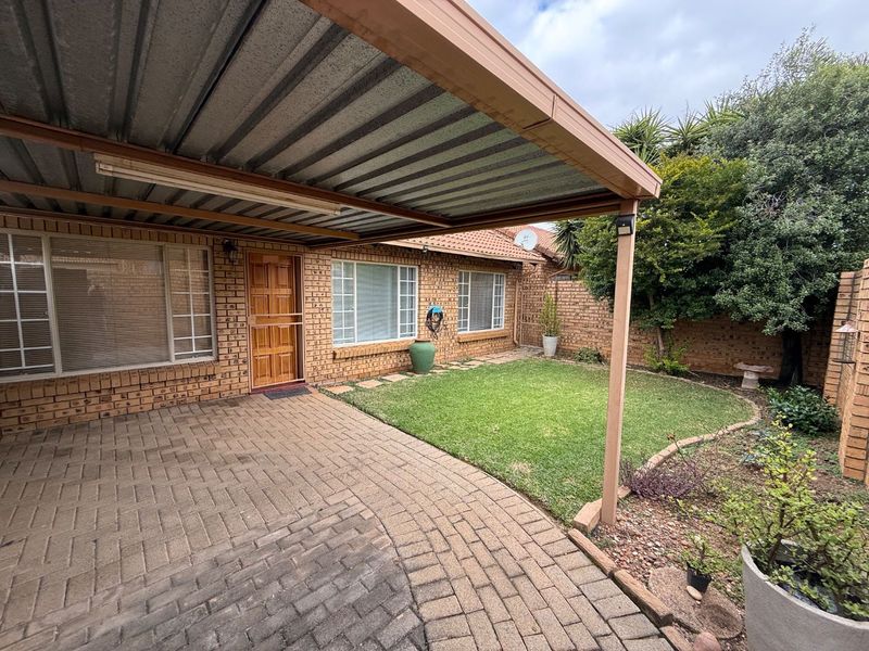 Stylishly Renovated Two-Bedroom Simplex with Double Garage and Garden - Photo 3