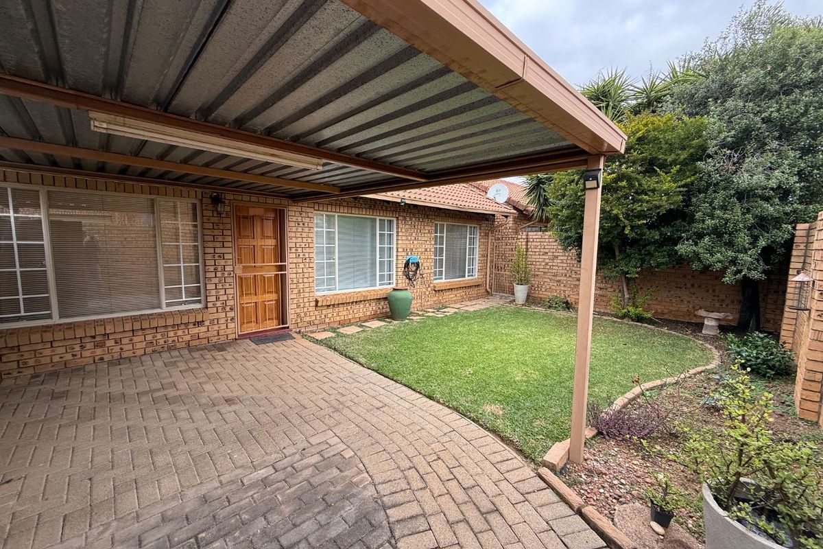 Stylishly Renovated Two-Bedroom Simplex with Double Garage and Garden - Photo 3