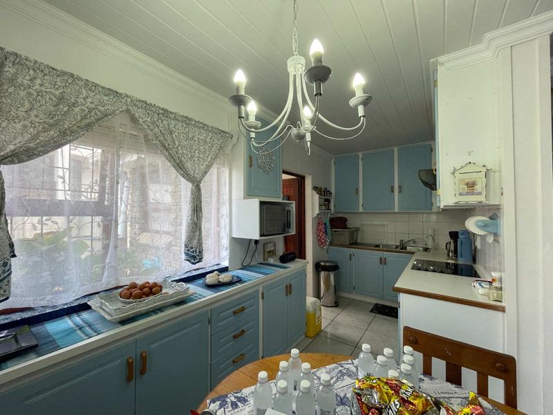 Prestigious Hartenbos Heuwels Home | 4 Bedrooms | Green Belt Views & Exceptional Privacy - Photo 8