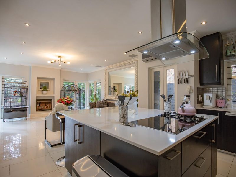 Elegant Four-Bedroom Home with Ample Space Available in Bryanston - Photo 6