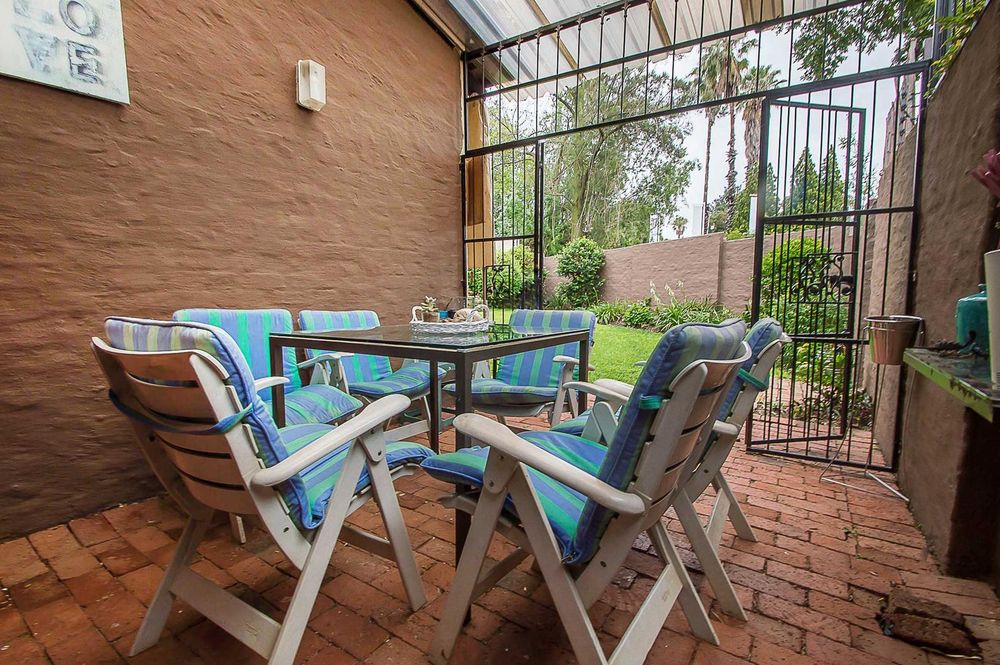 Covered patio off lounge with garden access 