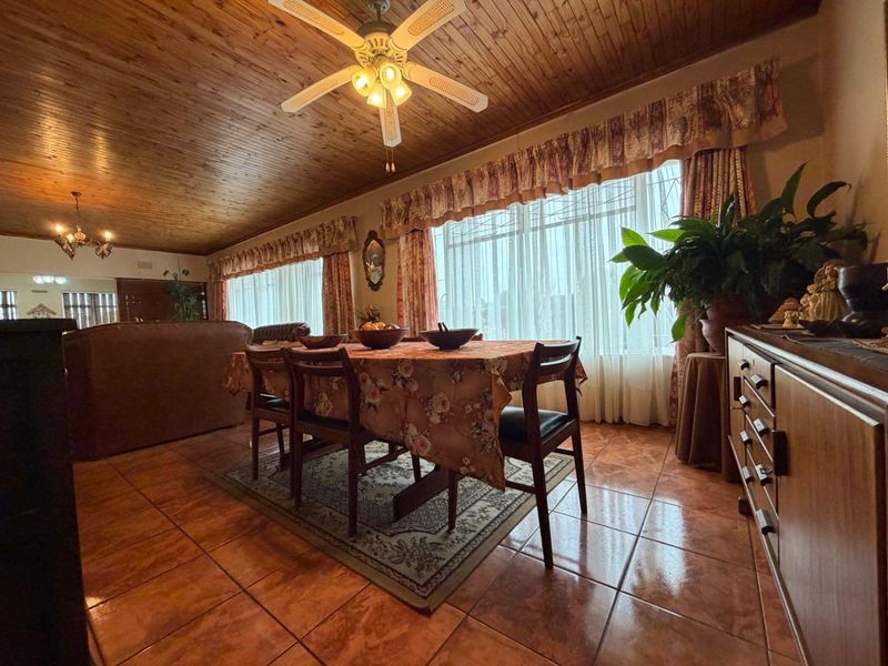 Some homes don't need to shout to be noticed—they simply welcome you in. - Photo 9