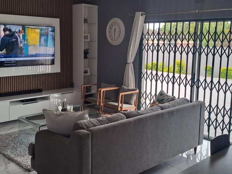 Step into this spacious and well-appointed 4-bedroom home, designed for comfortable family living and effortless entertaining. - Photo 5