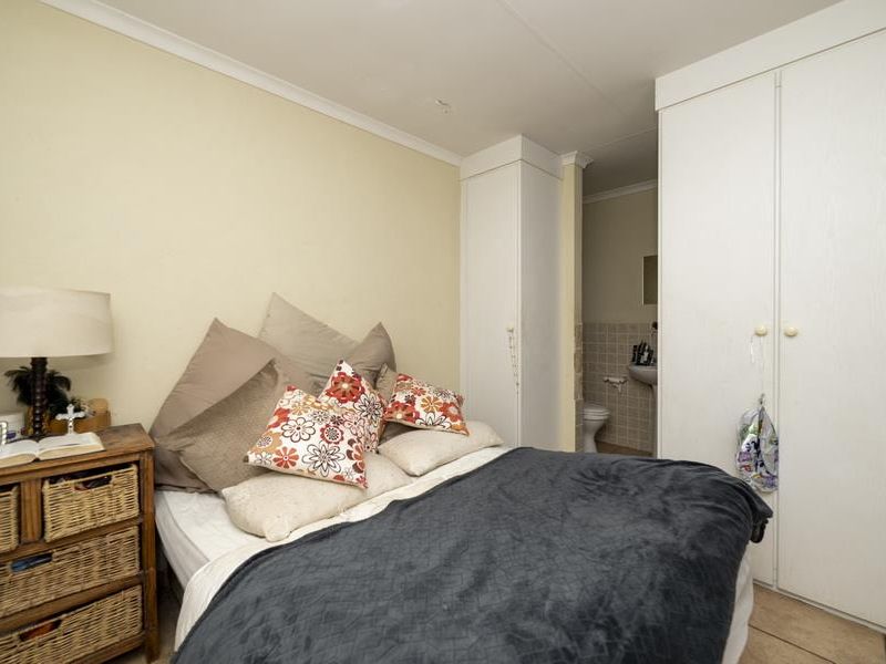 SECURE LIVING WITH POTENTIAL: 2-BEDROOM HOME WITH CHARM - Photo 8