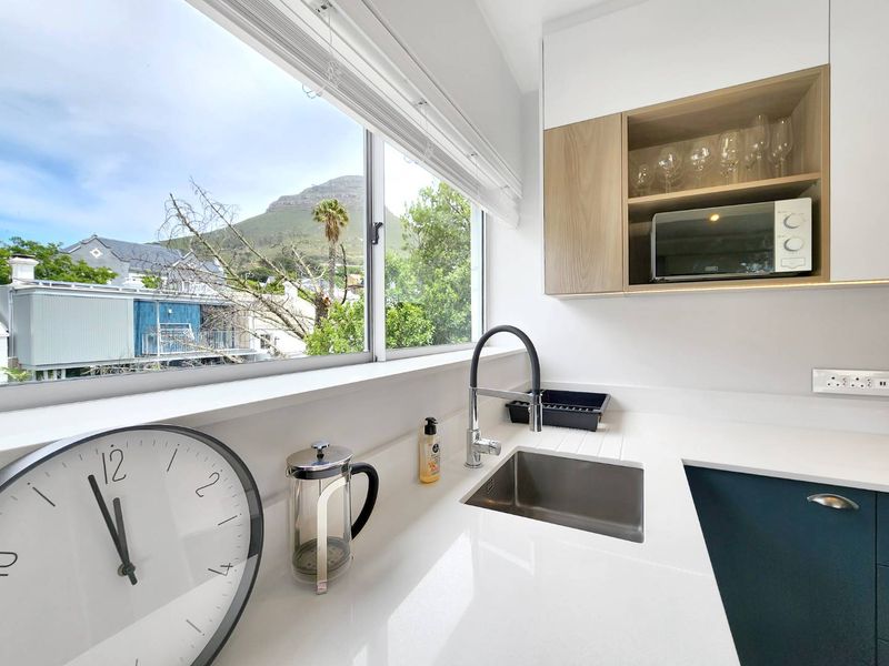 Top-Floor Gem in Upper Gardens with Stunning Table Mountain Views - Photo 9