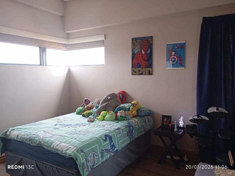 Elegant Family Living in Secure Glen Eagle Estate - Photo 2