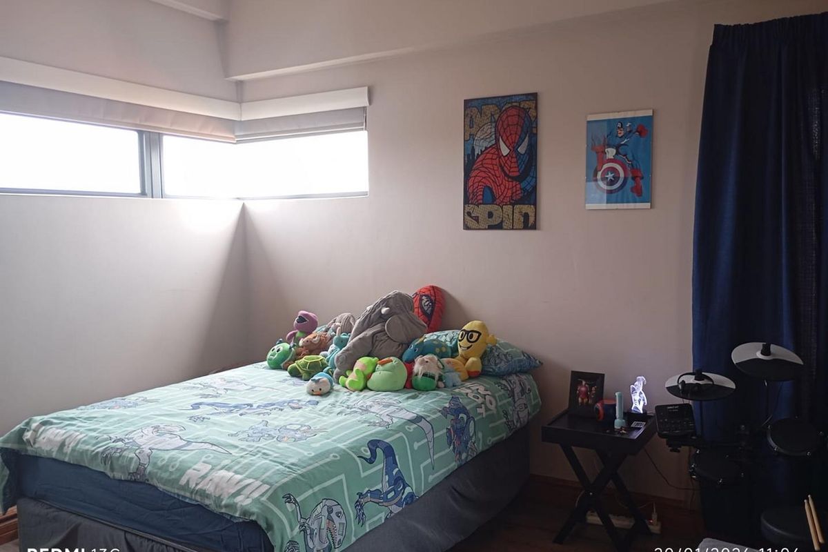 Elegant Family Living in Secure Glen Eagle Estate - Photo 2