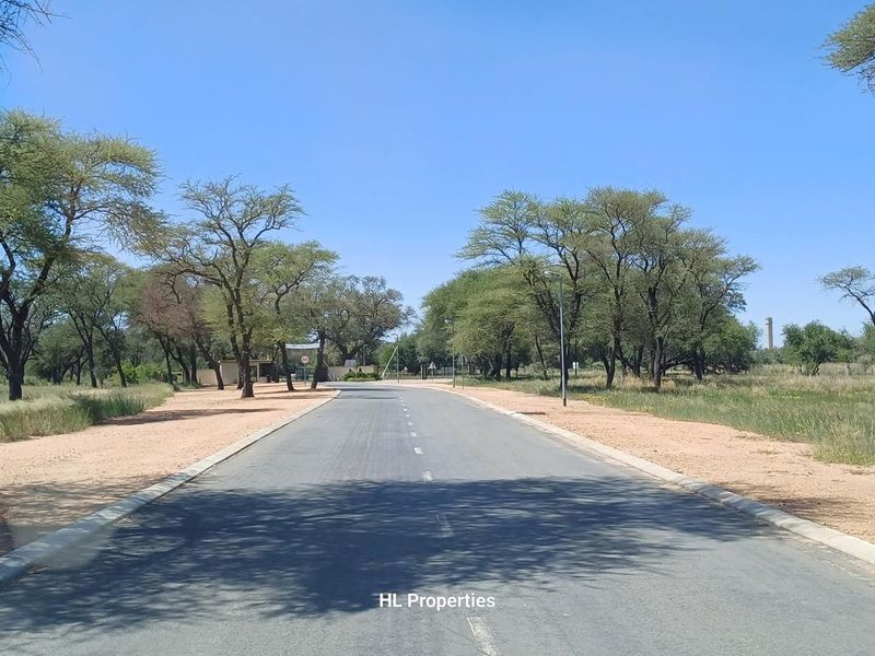 The erf is  well located and on a prime spot within the estate.  The Okahandja River as well as the picturesque Okahandja foothills make for the most beautiful - Photo 2