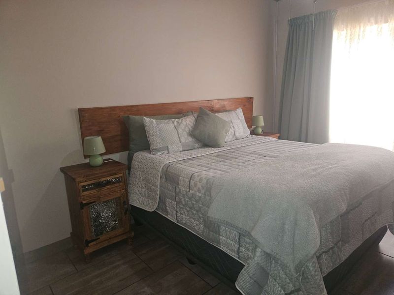 Charming Face-Brick Family Home with Modern Amenities and Exceptional Security - Photo 10