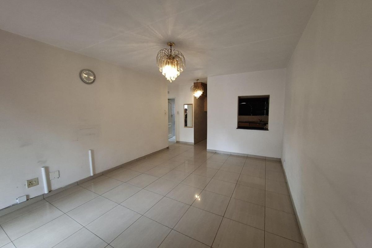 2 Bedroom Groundfloor Gem with Carport - Photo 4