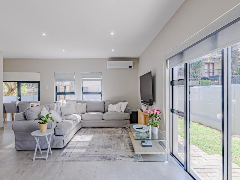 Modern Three Bedroom home in Security Estate - Olympus - Photo 2