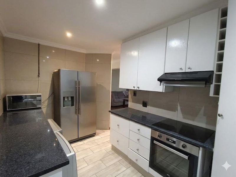 Modern Family Living in a Secure and Sought-After Complex - Photo 4