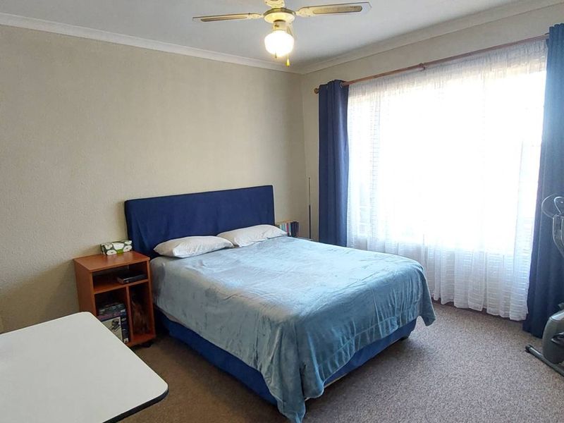 Secure Living: 2 Beds, Balcony, Carport & Storage Galore - Photo 7