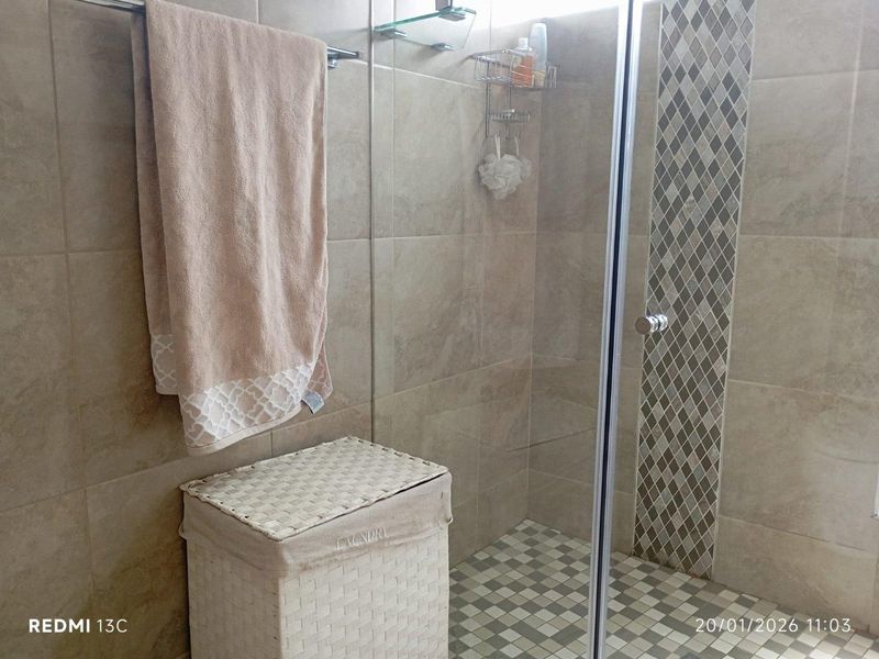 Elegant Family Living in Secure Glen Eagle Estate - Photo 7