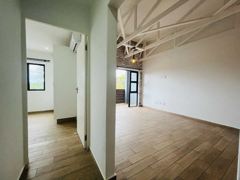 Hendra - Sleek Loft-Style Apartment with Solar Savings and Prime Location! - Photo 5