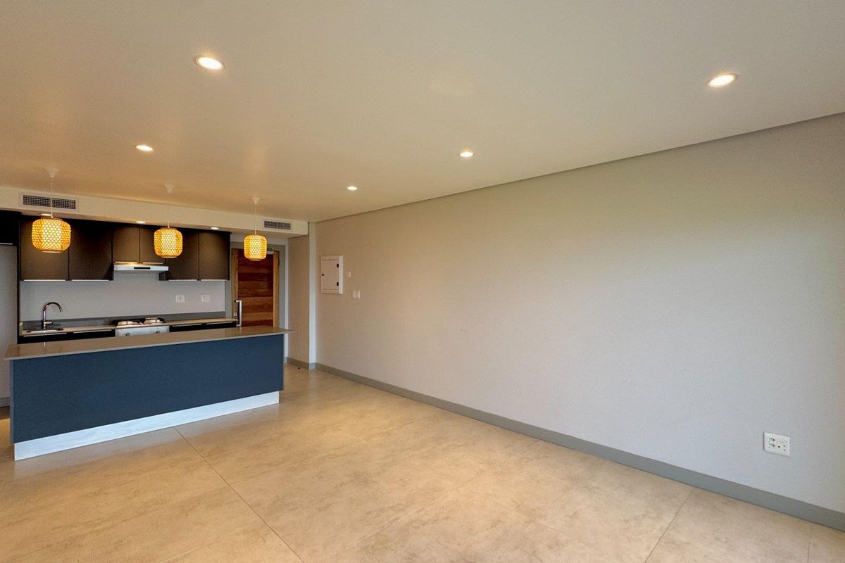 This is a premium, move-in-ready coastal apartment that combines luxury, security, and modern convenience in a sleek, never-before-lived-in space. - Photo 4