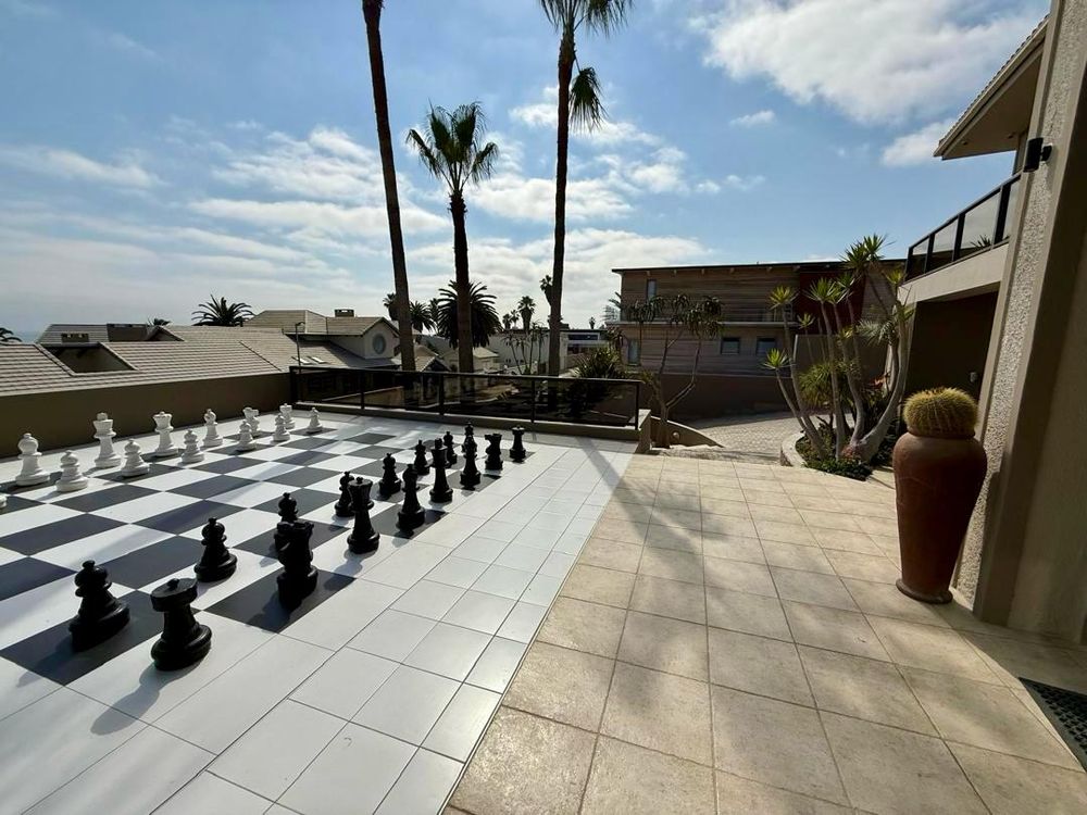 Large patio with man-sized chessboard