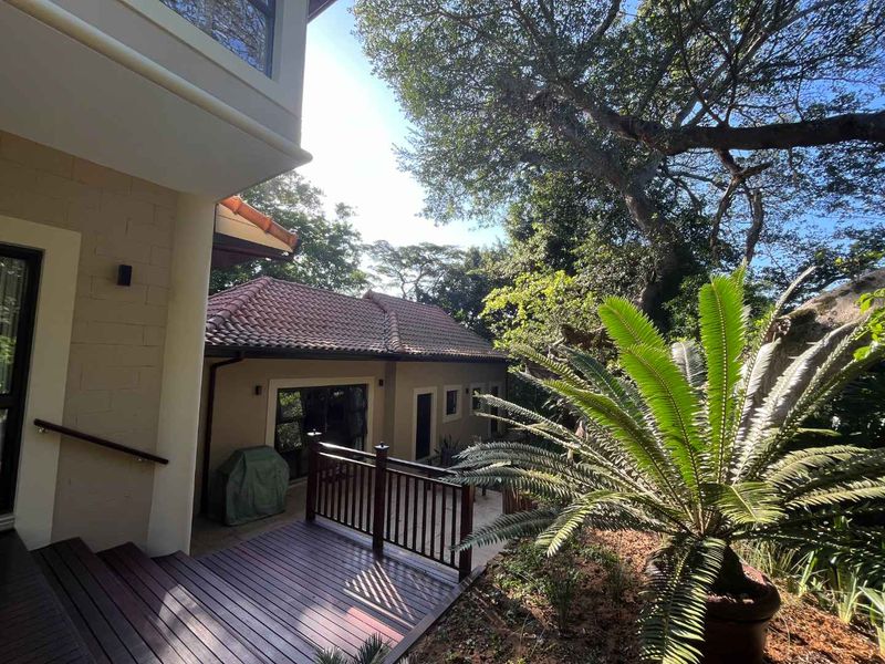 Zimbali offers a  beautiful 4-bedroom freestanding with a perfect blend of luxury and comfort, a thoughtfully designed layout and exceptional features - Photo 4