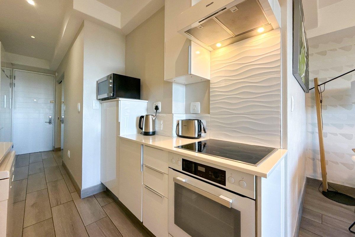 Fully Furnished 1-Bedroom Apartment at The Regency - Photo 2