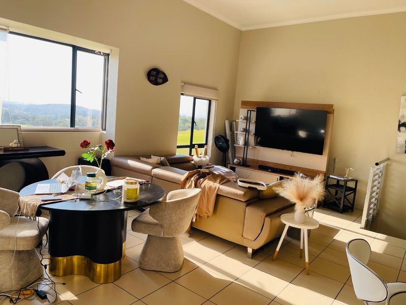 Stylish 2 bedroom, 2 bathroom penthouse in Jackal Creek Golf Estate - Photo 6