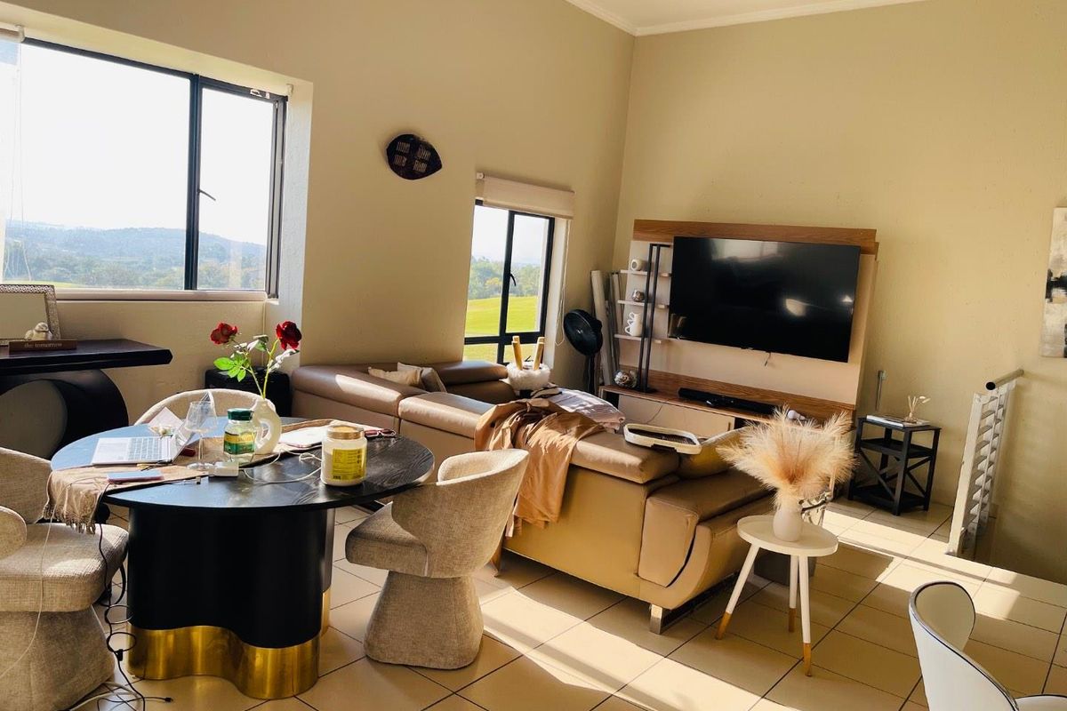 Stylish 2 bedroom, 2 bathroom penthouse in Jackal Creek Golf Estate - Photo 5