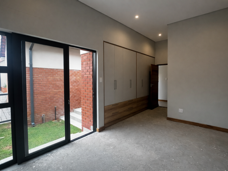 Elegant & Secure Retirement Living in Wild Olive Estate - Photo 9