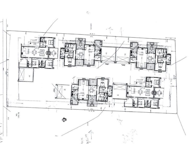 Architectural site plan showing the layout of multiple residential units on the property.