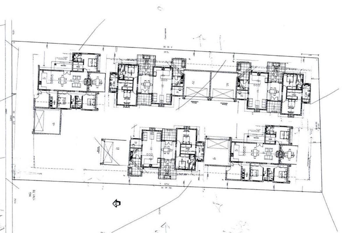 Architectural site plan showing the layout of multiple residential units on the property.